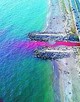 Enormi chiazze rosse in mare, è vernice